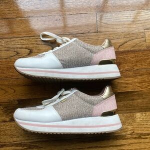 Pink Michael Kors shoes with rose gold accents